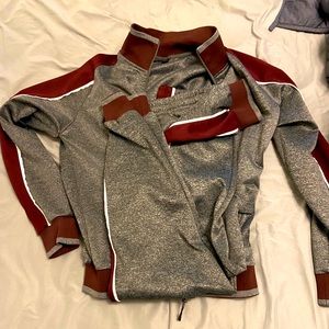 New, unused track suit (full sweatpants and top)
